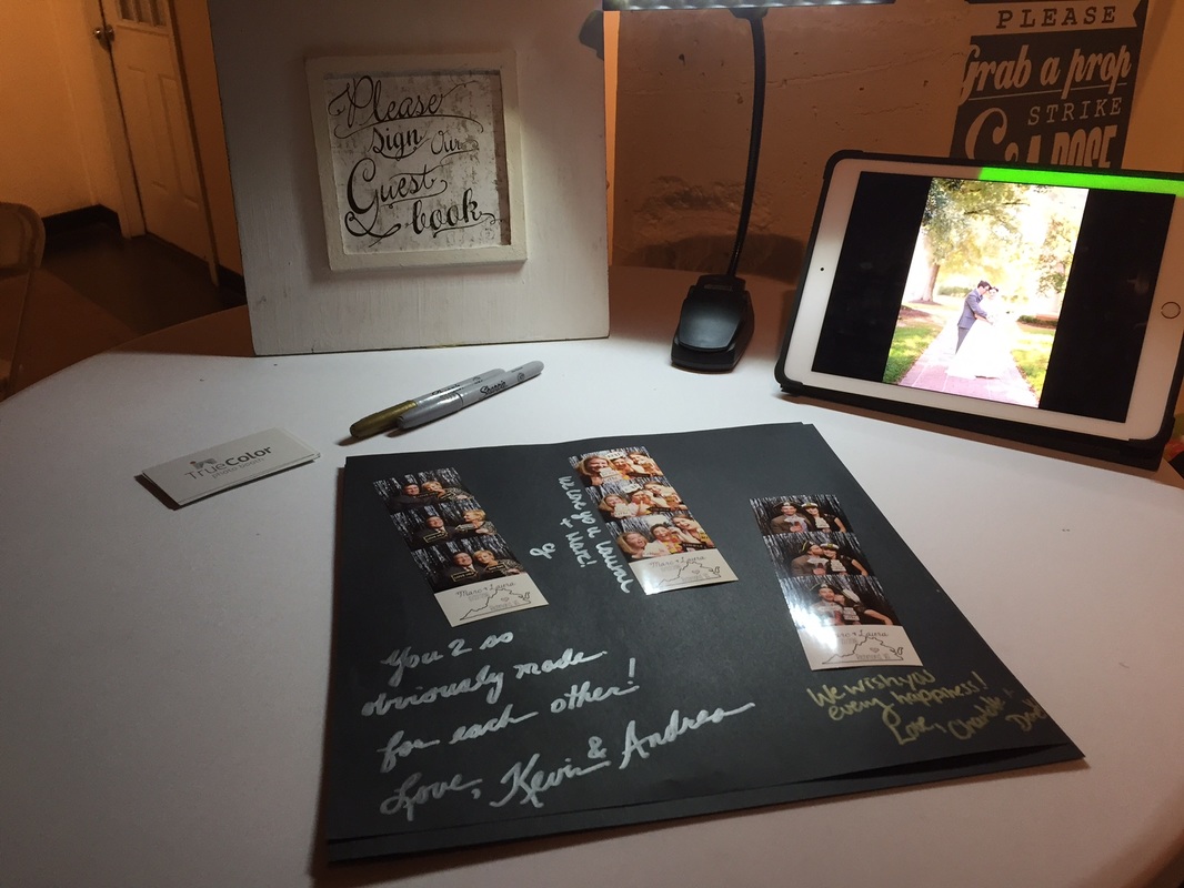 True Color Photo Booth set up for a wedding at Richmond Art Works using our awesome scrapbook
